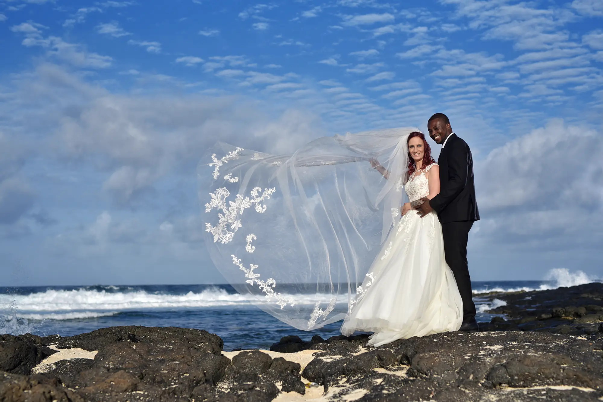 Couple walking along the east coast lagoon — engagement photography Mauritius by Bilaal Sadeer